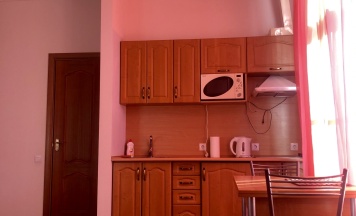 апартаменты студия с окном в ванной комнате в Ульберг