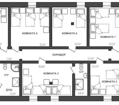 Кровать в общем номере с красивым видом из окна в Атлантида
