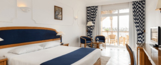 Двухместный клубный номер двуспальная кровать в Desert Rose Resort