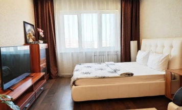 Четырёхместные апартаменты с балконом и с видом на город в Апартаменты Fresh Room on Stroiteley