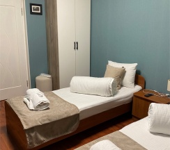 ДВУХМЕСТНЫЙ СТАНДАРТ с внешней личной ванной комнатой  и дополнительным местом в Ля Вилла