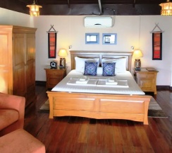 Двухместный коттедж двуспальная кровать в Amber Sands Beach Resort