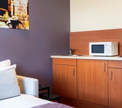Трёхместный люкс в Leonardo Hotel Salzburg City Center