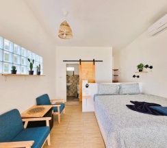 Двухместное бунгало Superior рядом с пляжем двуспальная кровать в Secret Beach Bungalows