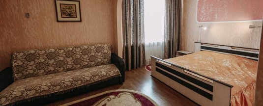 4-местный номер стандарт с 2 односпальными и 1 двуспальной кроватью в 858 км