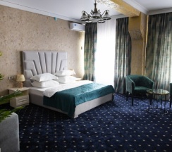 Улучшенный четырёхместный стандартный номер в Хан