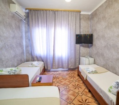 Четырёхместный номер Standard с балконом в Дельфин