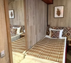 Двухместный номер "Мини-Стандарт" с раздельными кроватями,без балкона в White Peak