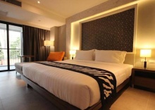 Номер Executive в Riqueza Suites Pattaya