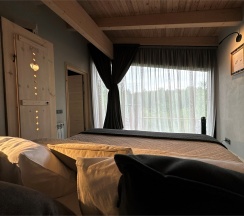 Шале 1 с расширенной террасой + Безлимитное посещение ЕлятыПарка в ЕлятыЛодж