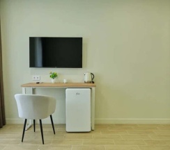 Улучшенная четырёхместная комната в Deus