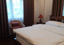 Трёхместный номер Deluxe в OYO 75430 At Wara Bed And Breakfast