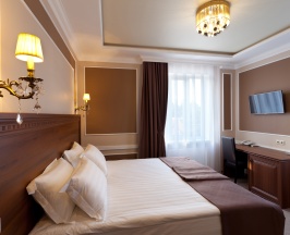 Первая категория (Стандарт с одной двуспальной или двумя односпальными кроватями) в Chocolatier