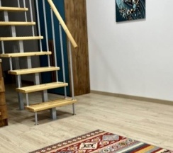 Двухуровневый ПОЛУЛЮКС с зоной отдыха на крыше в Santorini Family Club