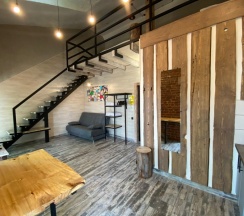 Семейные двухуровневые апартаменты с кухней в Loft Apart
