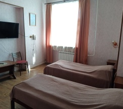 Кровать в общем номере (мужской номер) в Тенька