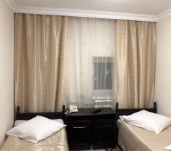 Двухместный номер Economy Цокольный этаж 2 отдельные кровати в Энергетик