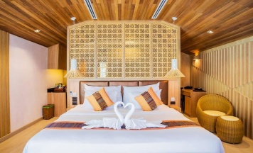 Двухместная вилла Seaside Wing Deluxe рядом с пляжем двуспальная кровать в Kacha Resort and Spa Koh Chang