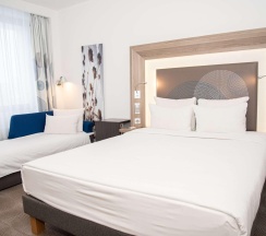 Номер стандарт семейный с 1 двуспальной кроватью в Novotel Krasnoyarsk center