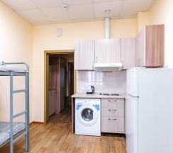 Кровать в 12-местном общем номере в Сириус