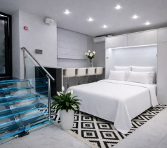1-комнатные апартаменты с 1 двуспальной кроватью, 28.8 м², цокольный этаж в Апартаменты на Ветеранов