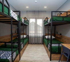 Кровать в общем женском номере с 3 двухъярусными кроватями (общие удобства) в Сириус