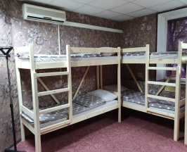 Кровать в 10-ти местном номере в Порт