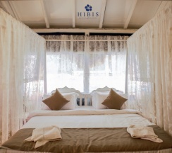 Двухместный коттедж двуспальная кровать в Hibis Hotels and Resorts