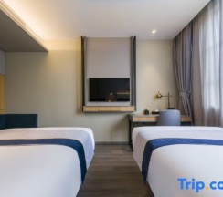 Двухместный номер Standard 2 отдельные кровати в Motel168 Shanghai Qi Bao Inn