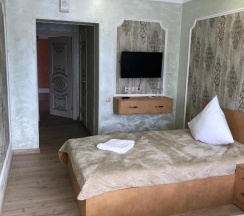 Номер стандарт с 2 односпальными кроватями в My house