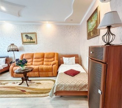 Студия-улучшенный семейный номер в Олимпия