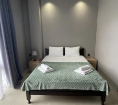 Двухместный люкс с балконом и с видом на горы двуспальная кровать в Maximus