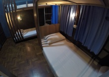 Кровать в общем номере в Wualai Hostel