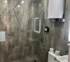 Двухуровневый ПОЛУЛЮКС с зоной отдыха на крыше и видом на бассейн в Santorini Family Club