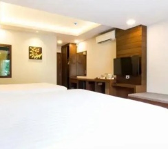 Четырёхместный семейный номер Sapphire с видом на город в The AGATE Pattaya Boutique Resort