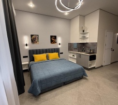Номер люкс с 1 двуспальной кроватью в Home Sharing