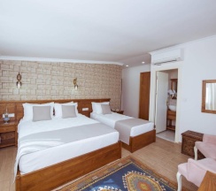 Трёхместный номер Superior в Infinity City Hotel