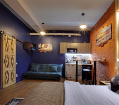 Студия с кухней с диваном и финской сауной "Леший" (сауна оплачивается отдельно) в Матросский