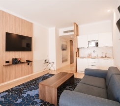 Люкс "Гранд" (Апартамент с 1 спальней) в Кортъярд Марриотт Сочи Красная Поляна