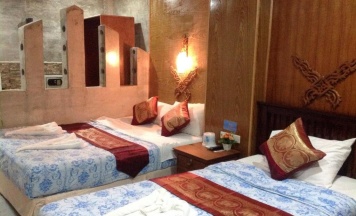 Двухместный номер Standard с видом на сад двуспальная кровать в Ruan Mai Naiyang Beach Resort