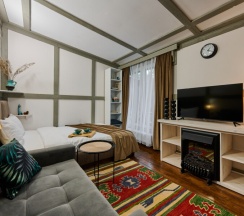 Номер в квадродоме с электрокамином в Алино