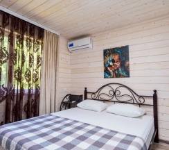 Домик в лесу в Villa la vita