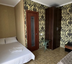 Четырёхместный семейный номер Superior с балконом и с красивым видом из окна в Morskoy priboy