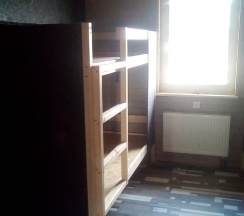 Кровать в четырхместном номере в Якорная