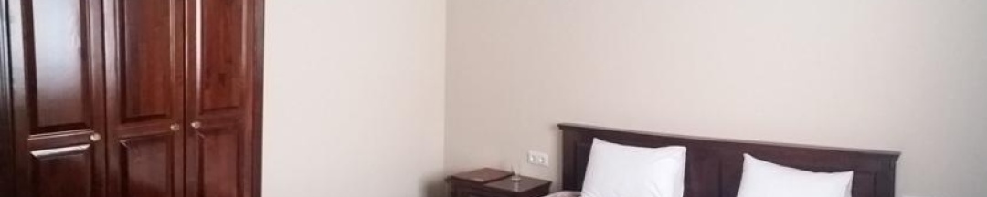 Номер стандарт улучшенный с 1 двуспальной кроватью в Трудармейский развлекательный комплекс