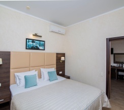 Номер улучшенный семейный в Колибри