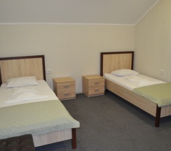 Двухместный с ванной комнатой двумя кроватями в Стандарт