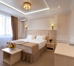 Первая категория (Комфорт с одной двуспальной или двумя односпальными кроватями) в Chocolatier