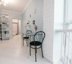 Четырёхместные апартаменты c 1 комнатой с балконом в Апартаменты Light apartment lxt.by