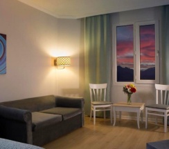 Угловой люкс с балконом в Antalya Adonis Hotel